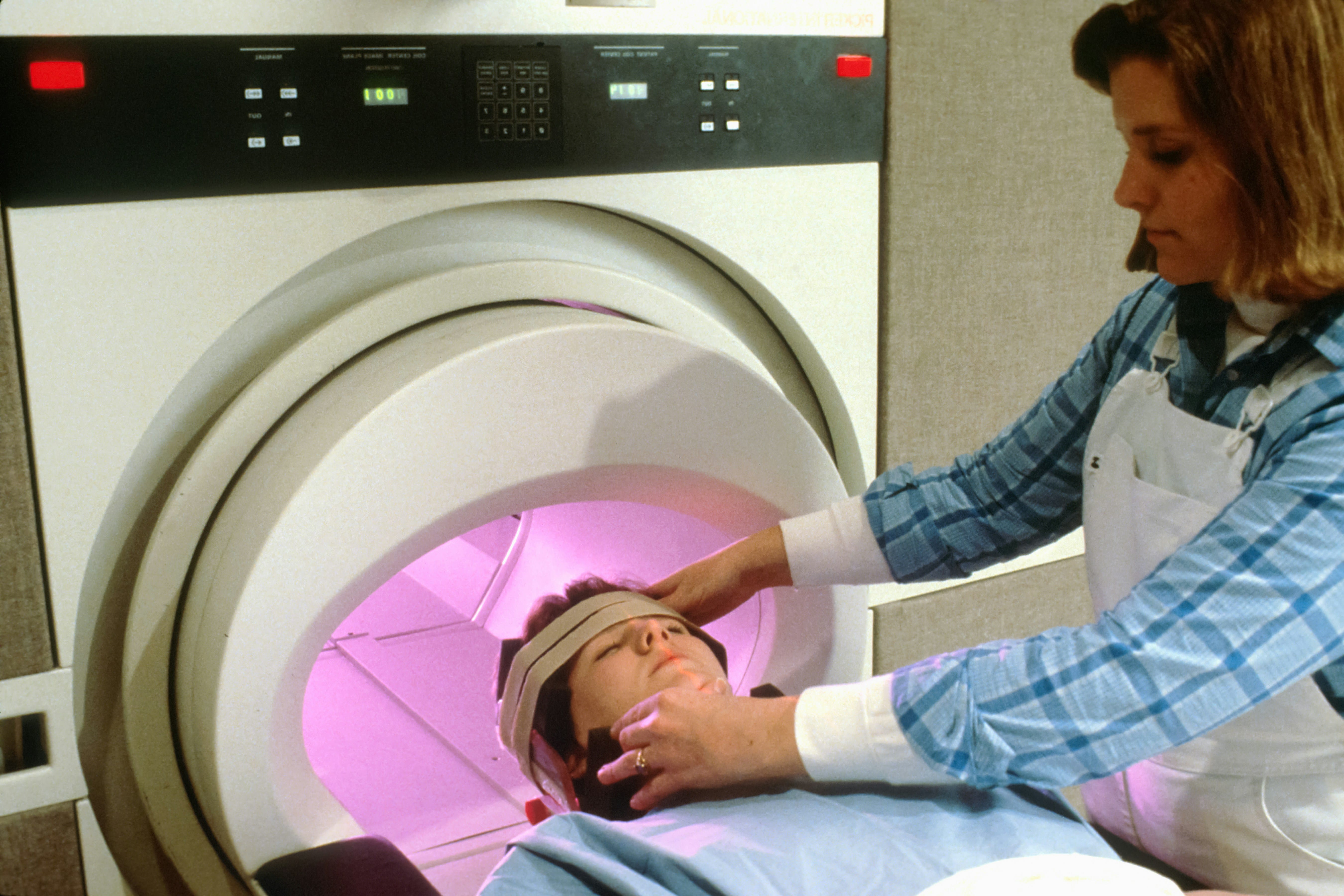 Emotion regulation success tracks brain-wide gradient reconfiguration