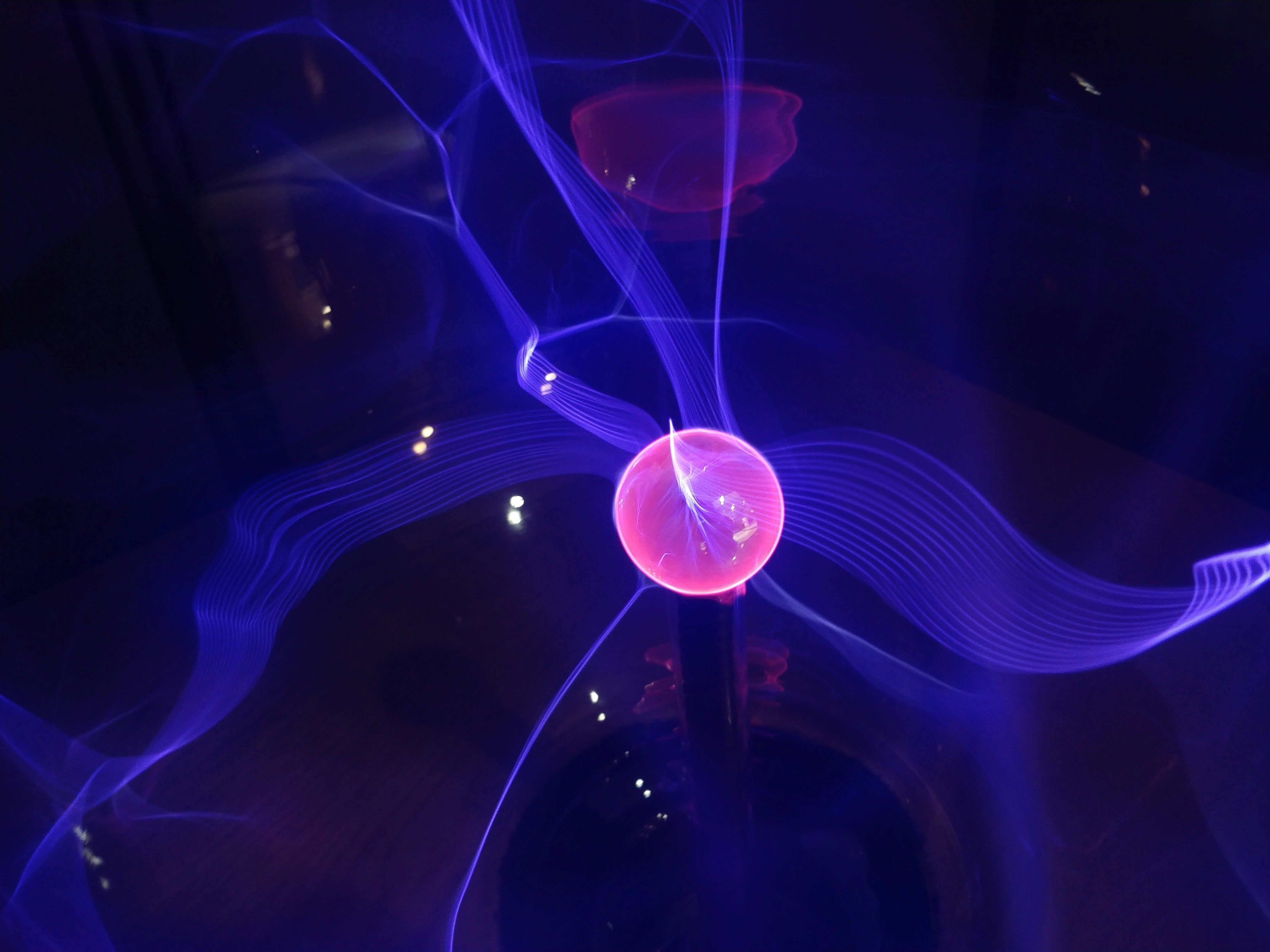 Shock precursor type changes ion and electron acceleration