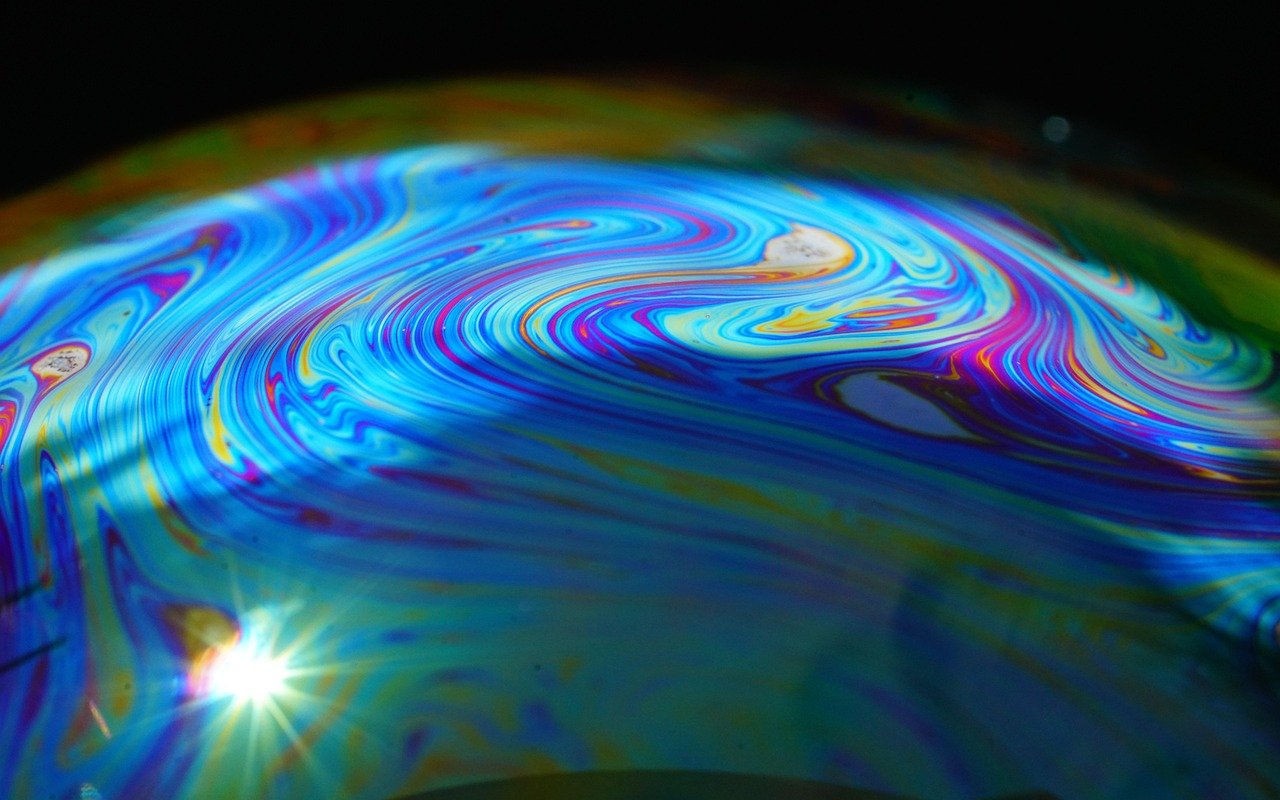 Solar granulation affects spectral lines differently by ionization state